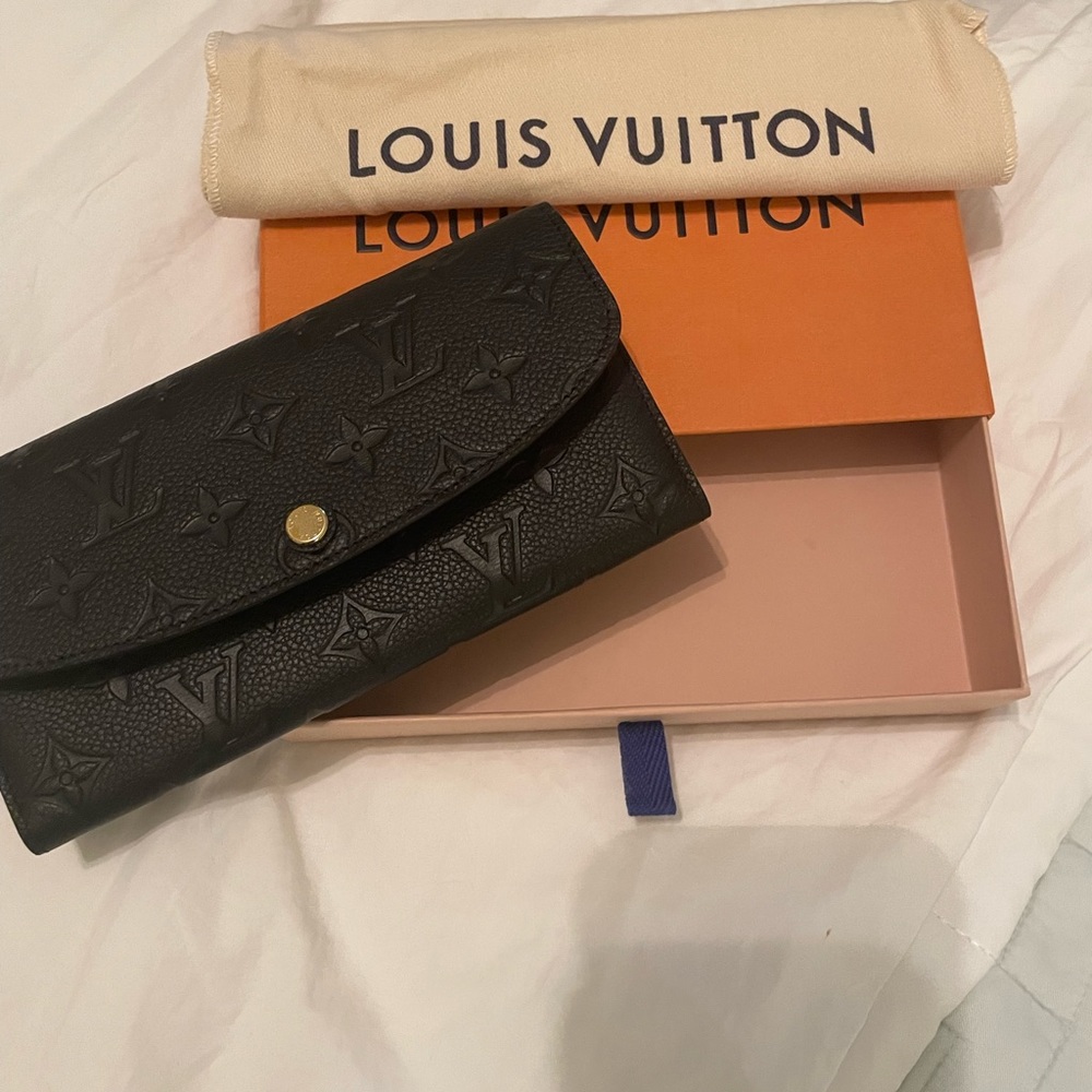 Louis Vuitton Emilie wallet new with tags never used